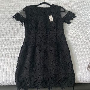 Romeo and Juliet couture lace dress , new with tags .